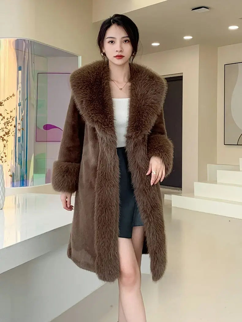 Luxurious brown fur-trimmed winter coat with plush collar and cuffs.