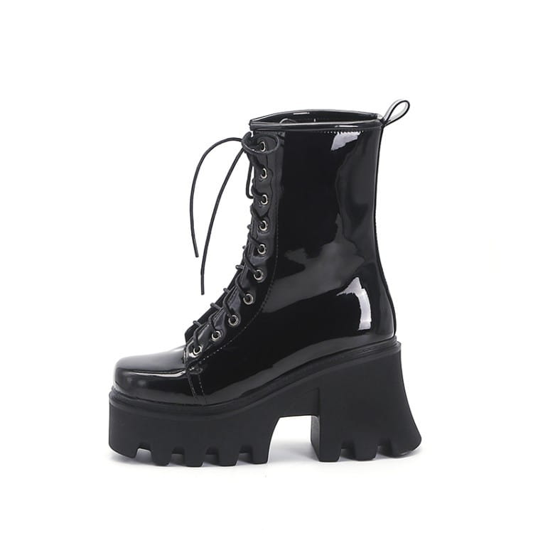 Black Patent Boots with Thick Heels and Chunky Sole for a trendy, edgy look.