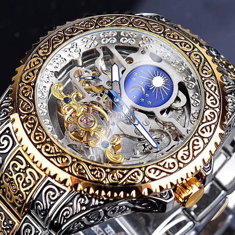 Ornate Men's Skeleton Stainless Steel Carved Tourbillon Mechanical Watch with blue moon phase dial.