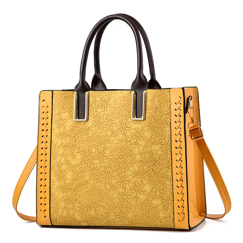 Bright Yellow Luxury Elegant Shoulder Bag with floral embossing and brown handles.