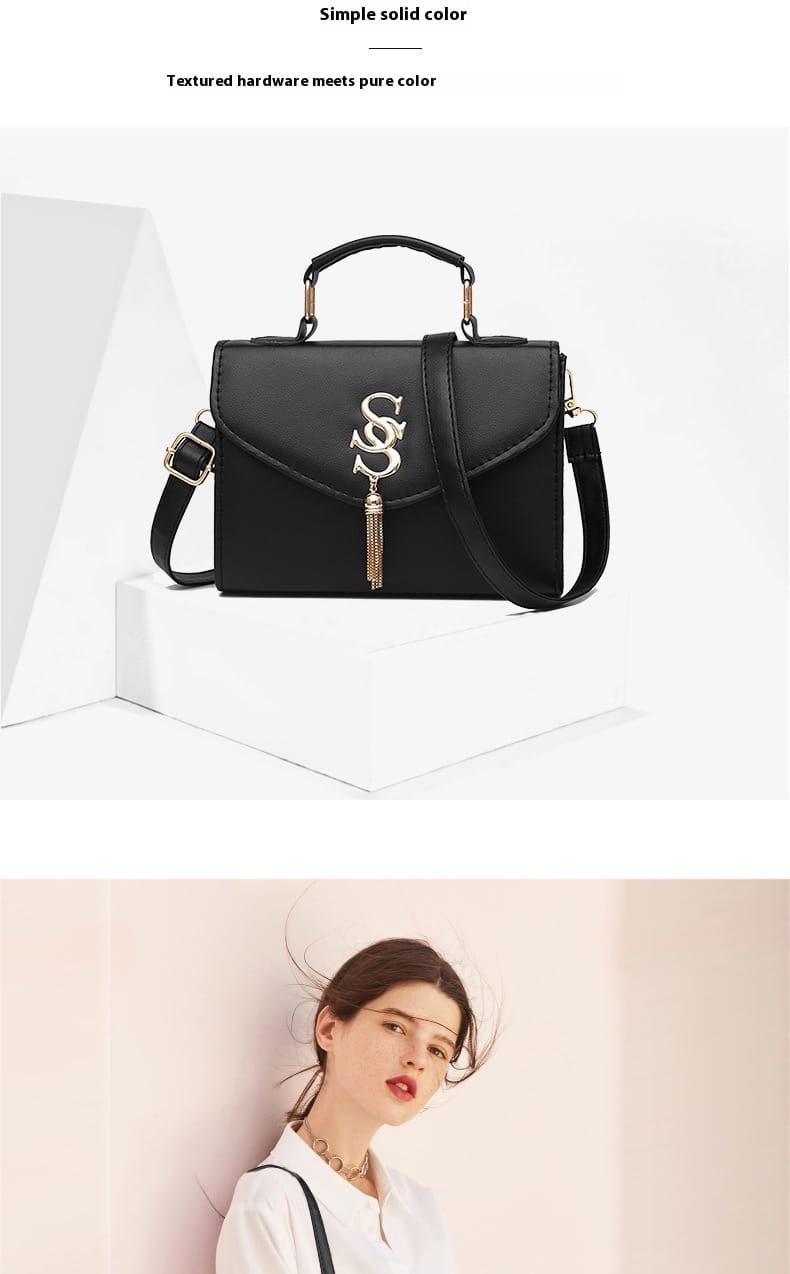 Black leather handbag with S-shaped clasp, perfect for stylish fashion shoulder messenger use.