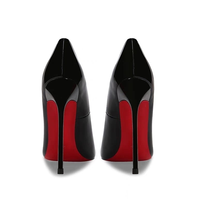 Black patent leather stiletto heels with red soles from Pure Desire Luxury for effortless style.