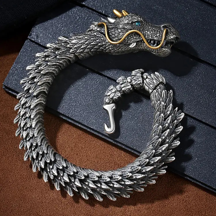 Silver dragon bracelet with scale details and gold accents for a stylish plated mens retro look.