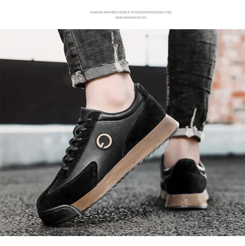 Black sneakers with gum sole and logo, perfect men’s casual flat trainer shoes.