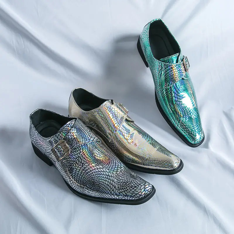 Three shiny Iridescent Patent Metallic Snake Print Buckle Dress Shoes in silver and turquoise.