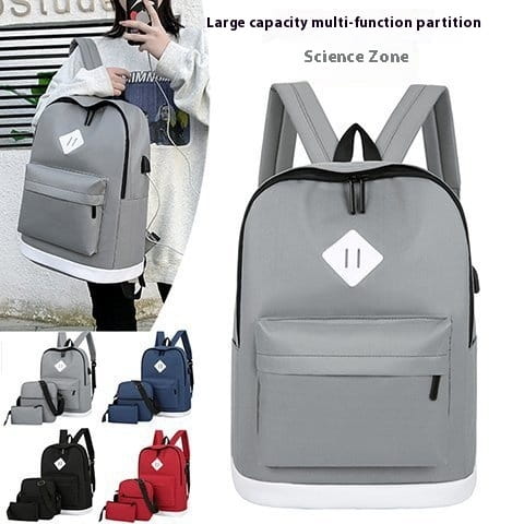 Multi-compartment Large Capacity USB Backpack with gray fabric and white diamond patch.