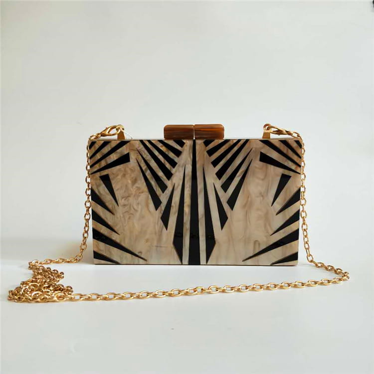 Art Deco Geometric Pattern Acrylic Clutch Purse with black and gold style.