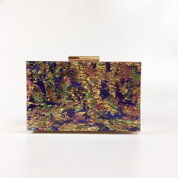 Colorful Womens Pearl Acrylic Dinner Clutch Bag with gold clasp and abstract pattern.