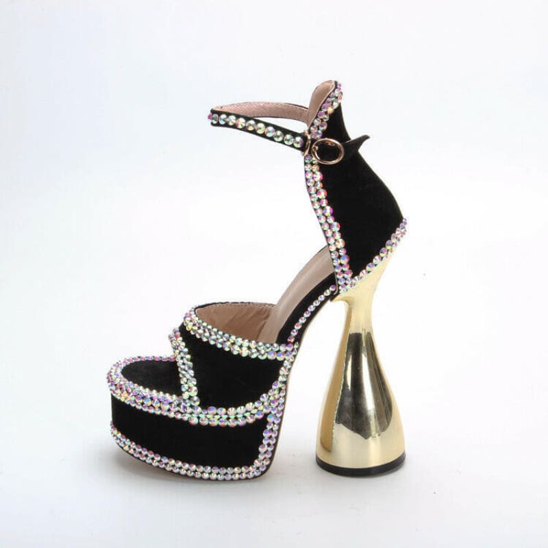 High-heeled platform sandal with black velvet and rhinestone embellishments on a gold-colored flared heel.