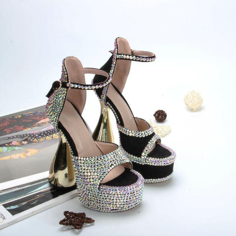 Glittery platform high heels with rhinestone embellishments and gold metallic heels.