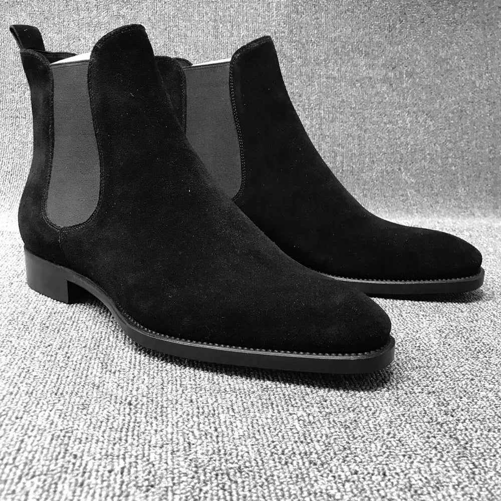 Black suede pointed toe high-top Chelsea boots for men with elastic side panels.