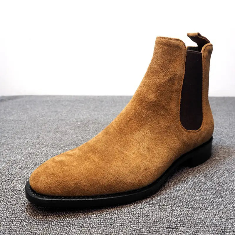 Tan suede pointed toe high-top Chelsea boots for men with elastic side panels.