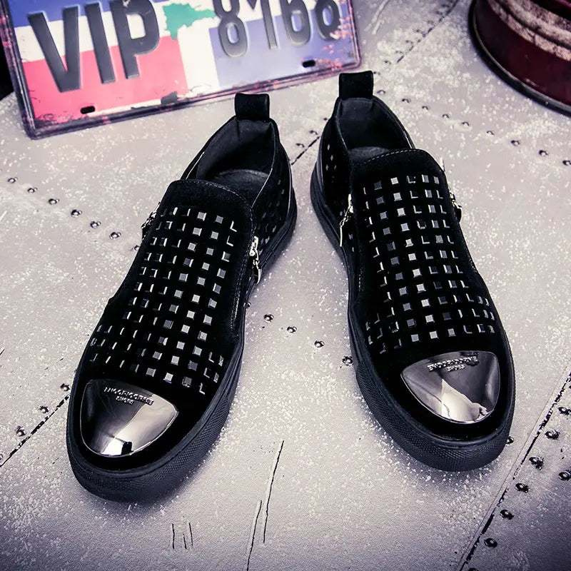 Black studded loafers with metallic toe caps for a bold look in rhinestone studded fashion.