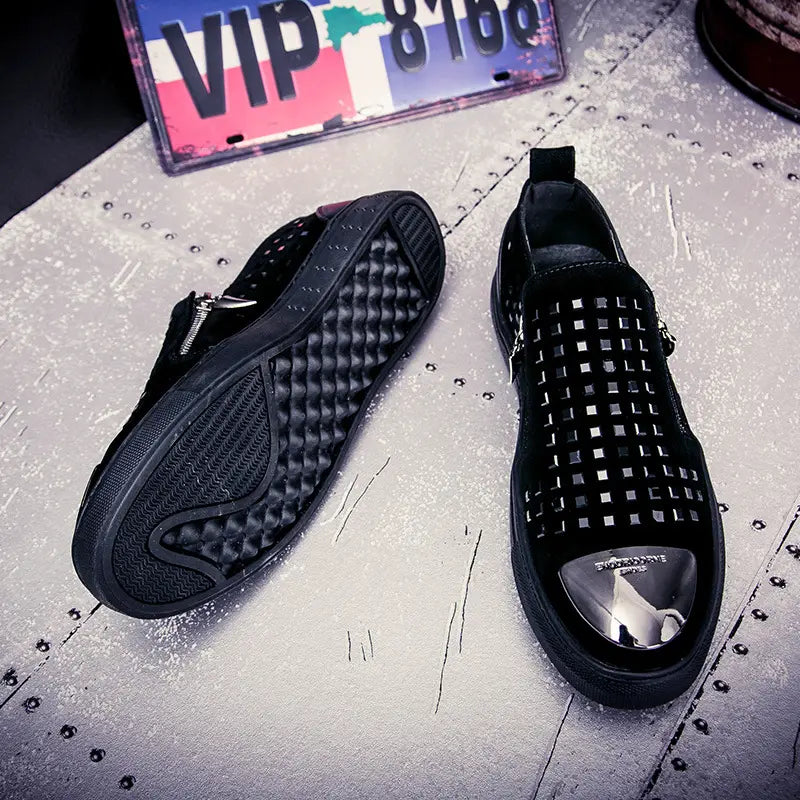 Black studded slip-on sneakers for a bold look in British style rhinestone fashion.