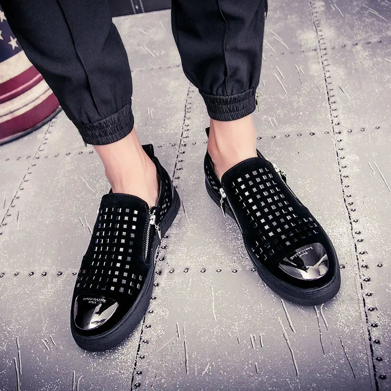 Black studded slip-on shoes with metallic toe caps for a bold British style rhinestone look.