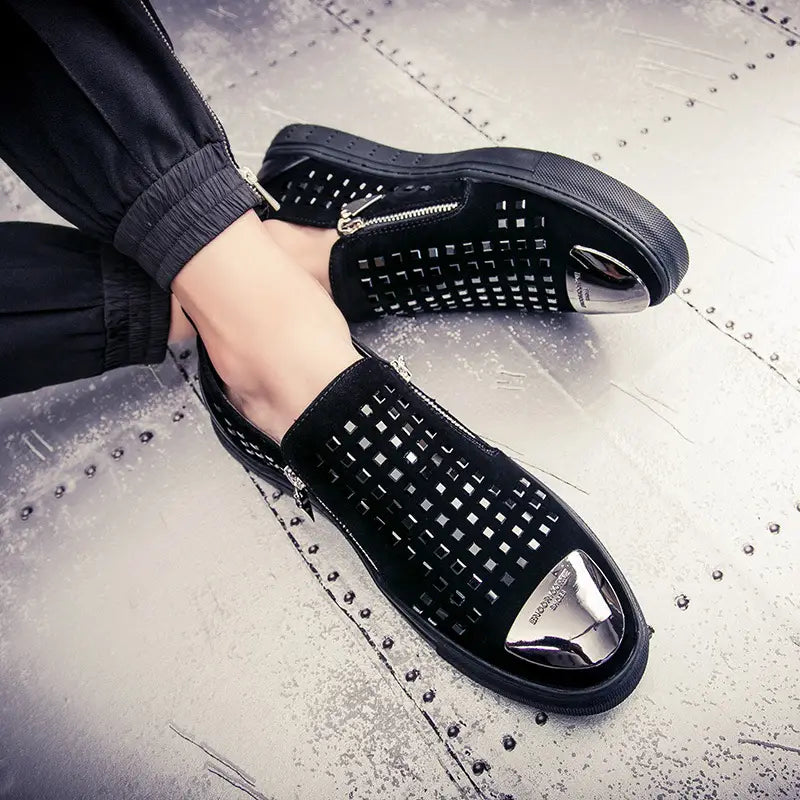 Black patent leather dress shoes with woven upper and metallic toe caps for bold studded fashion.