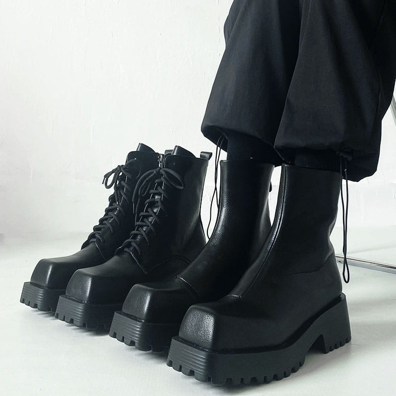 Black Thick Sole Martin Boots for Men with chunky treaded soles and lace-up fronts.