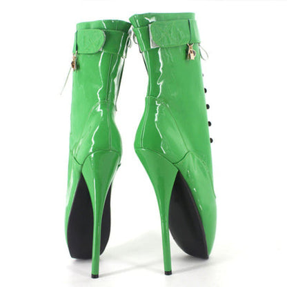 Pair of bright green patent leather high-heeled ankle boots with locking cuffs.