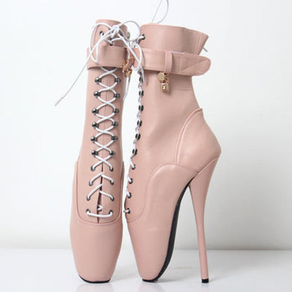 Pink leather ballet-inspired stiletto boots with lace-up front and ankle strap.