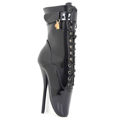 Extreme high-heeled black ankle boot with lace-up front and pointed toe.