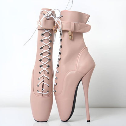 Pale pink high-heeled ballet boot with laces and a small lock.