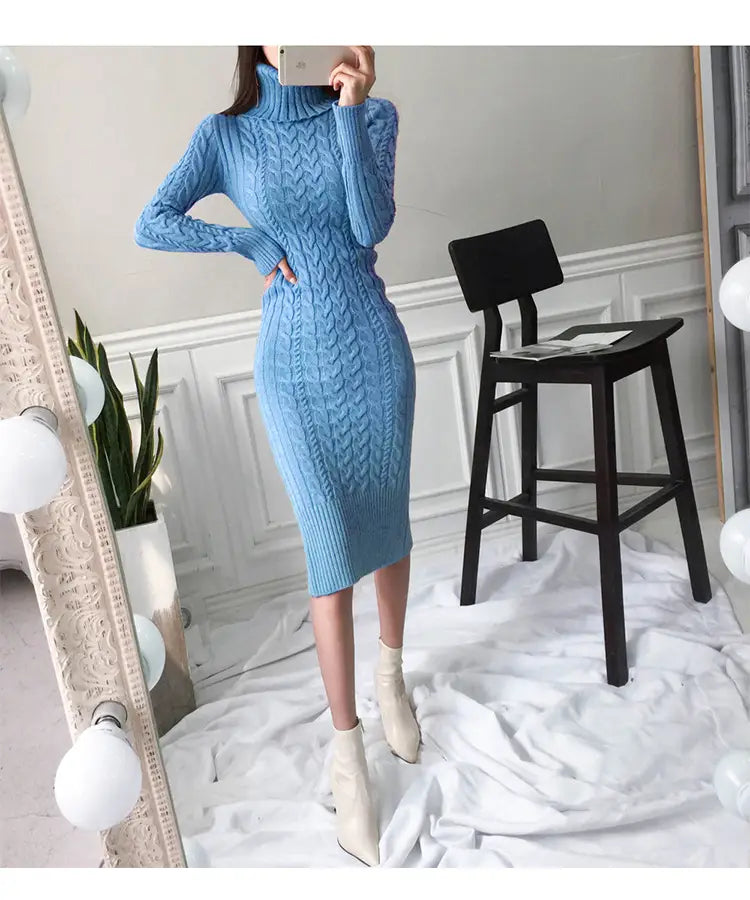 Light blue ladies roll neck knitted figure hugging maxi dress in a cozy cable-knit style.