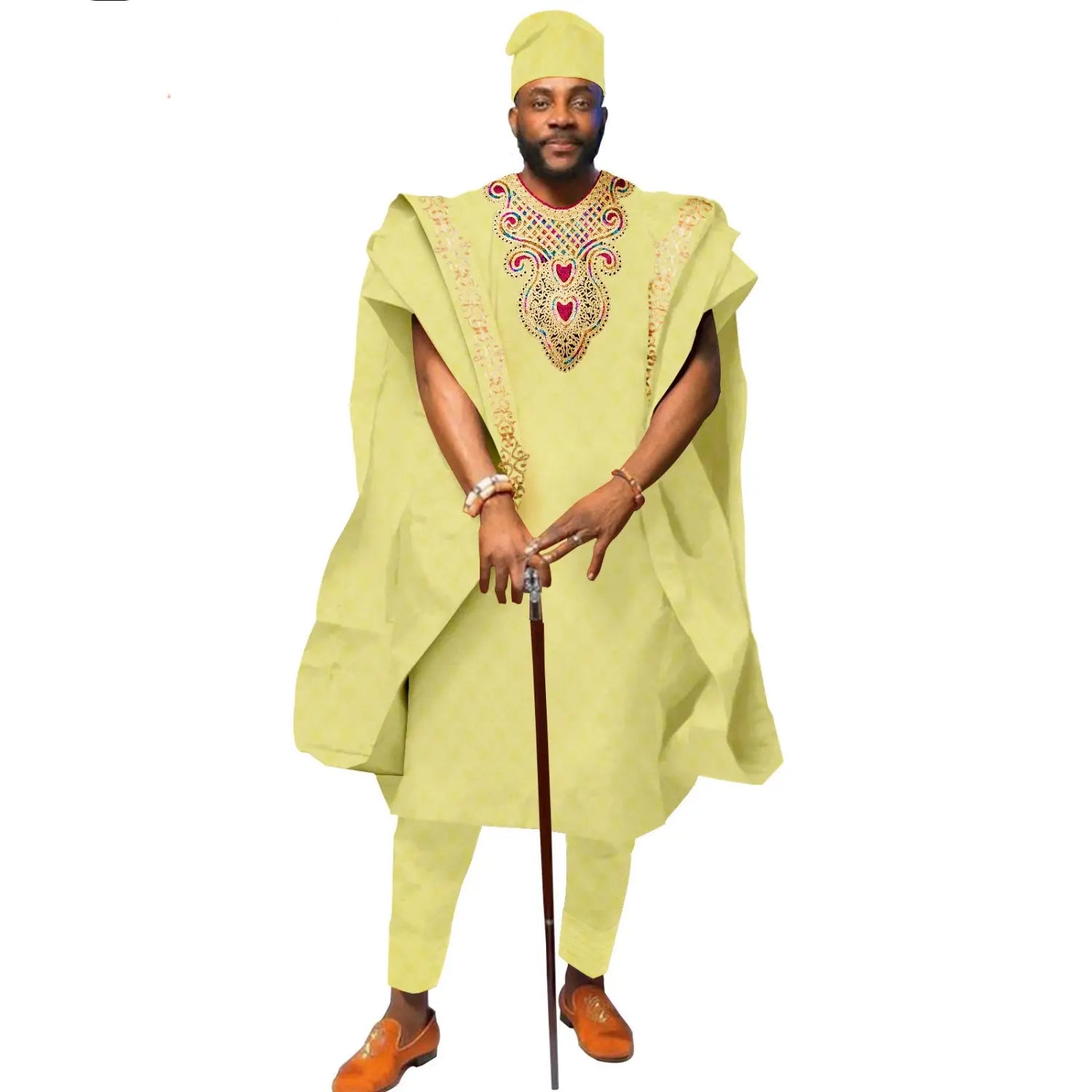 Lime green Traditional African Cotton Wedding Suit with embroidered agbada, cap, and shoes.