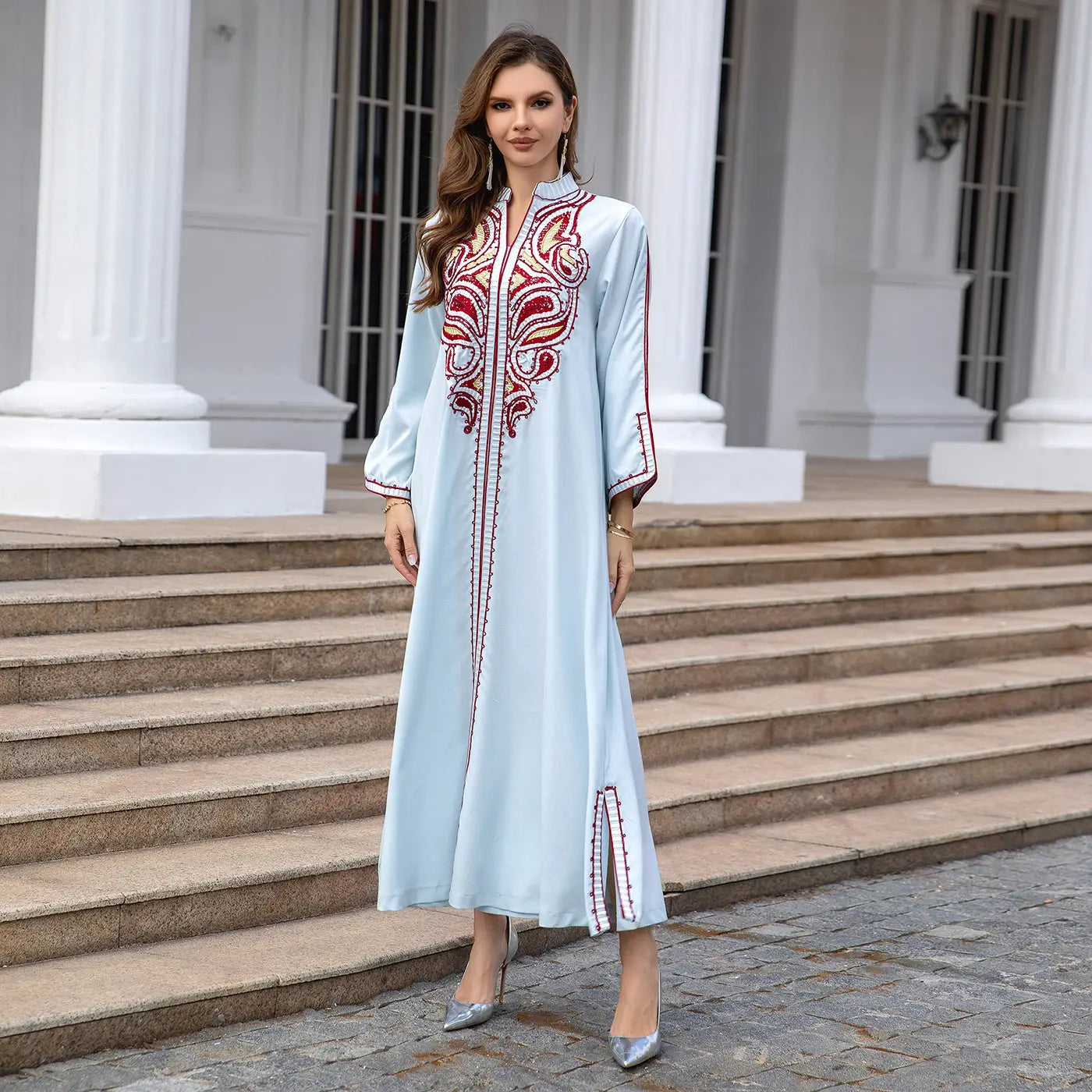 Light blue Muslim Middle East embroidery kaftan dress with red details and long sleeves