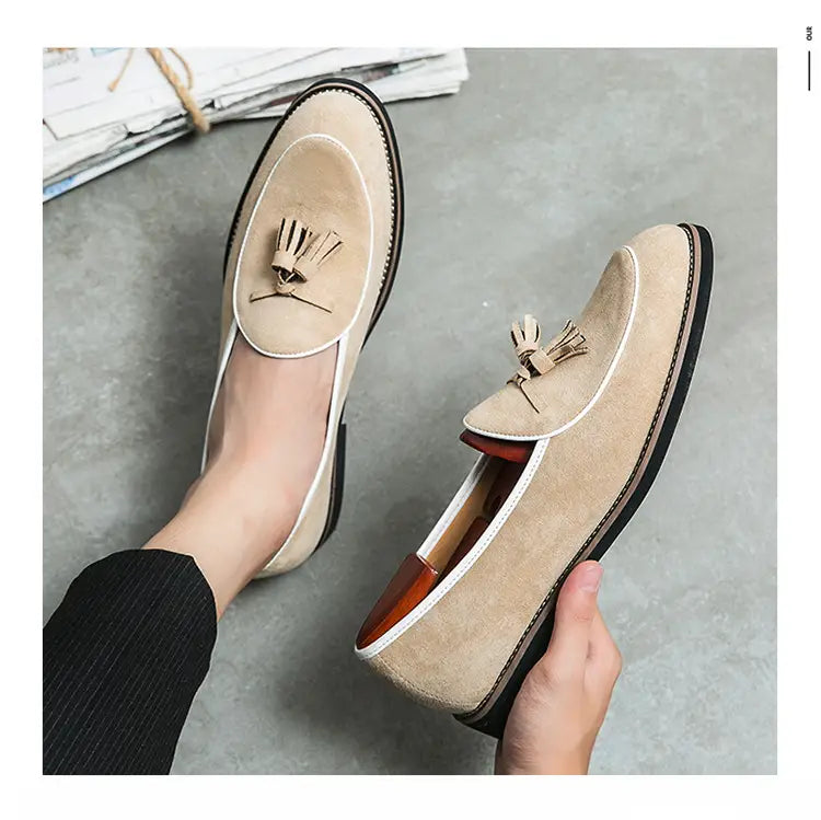 Beige leather loafers with tassels, perfect for the latest mens fashion trend.