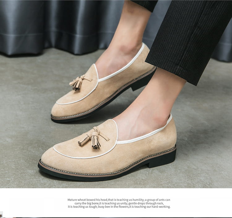 Beige suede loafers with tassels, perfect for the latest mens fashion trend.