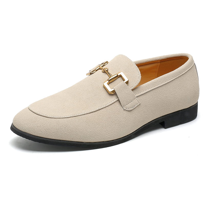 Beige suede leather loafer with gold hardware, perfect for casual driving.