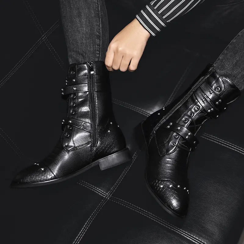 Black leather studded ankle boots with buckle details for ceremonial motorcycle rides.