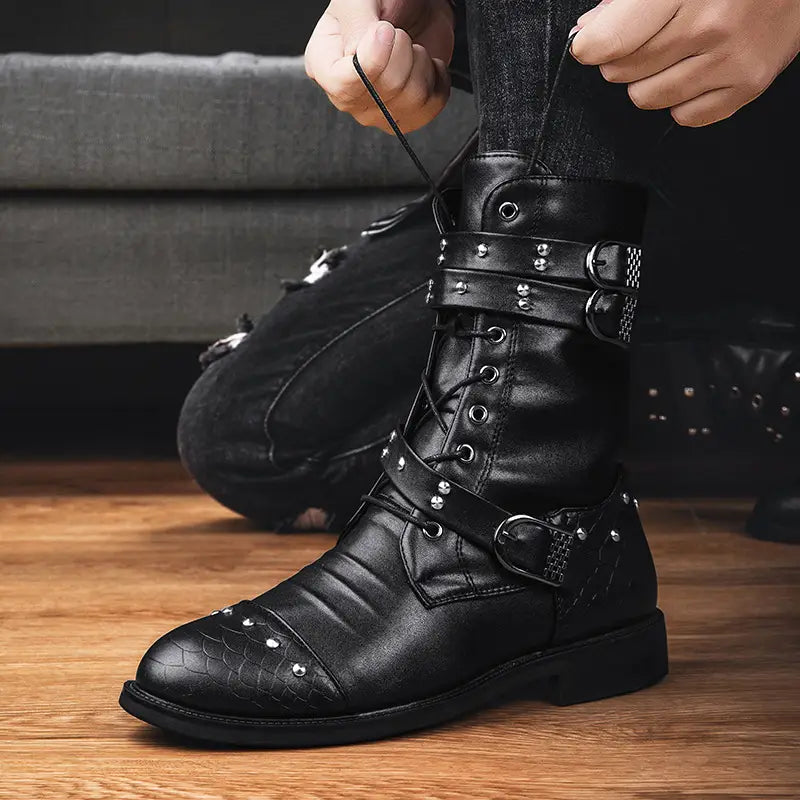 Black leather combat boot with buckles and studs for ceremonial motorcycle rides.