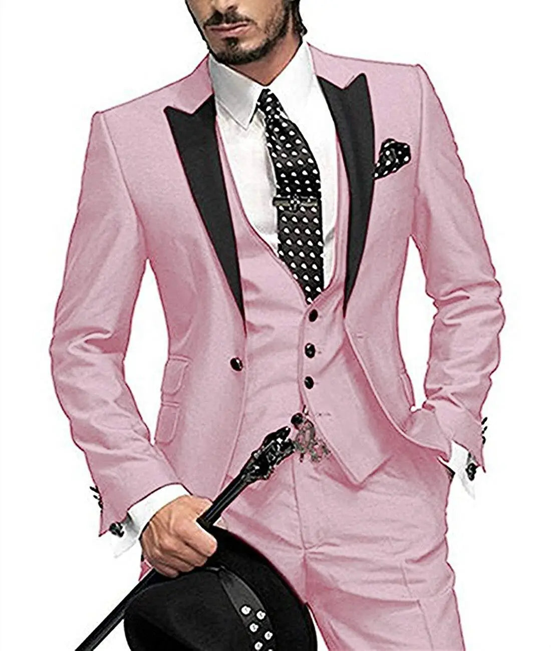 Pink three-piece suit with black lapels for the groom’s best wedding look.