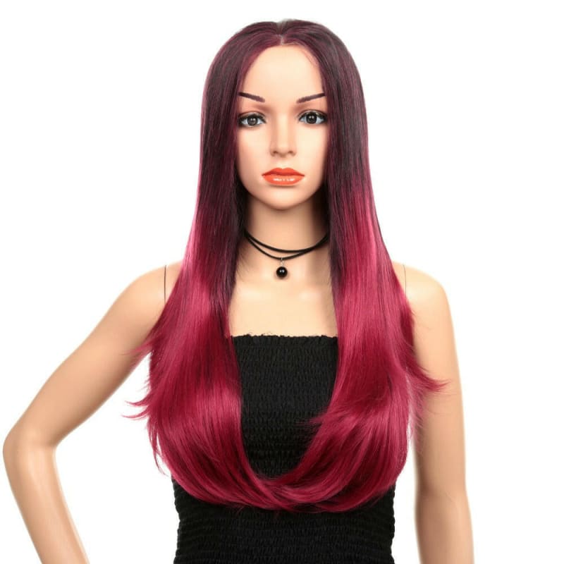 Long, straight wig with an ombre effect transitioning from dark roots to vibrant pink ends.