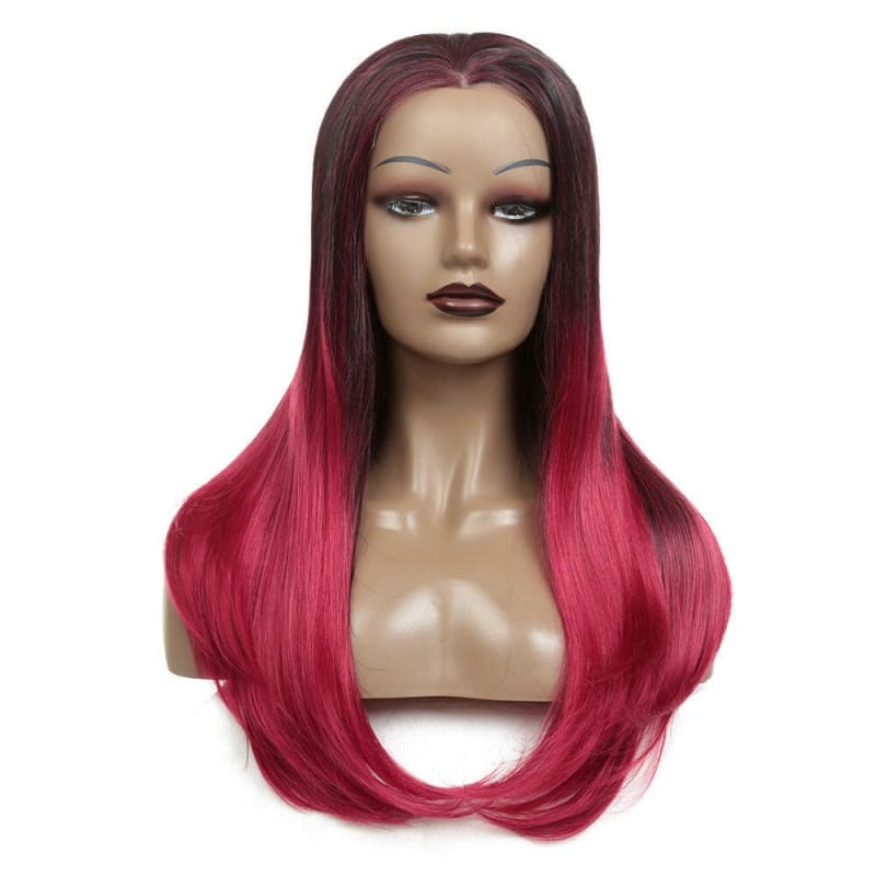 Long wig with ombre coloring from dark brown to vibrant pink.