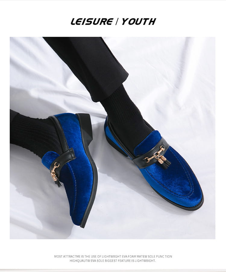 Bright blue velour moccasin with gold buckle and black socks for men’s British style.