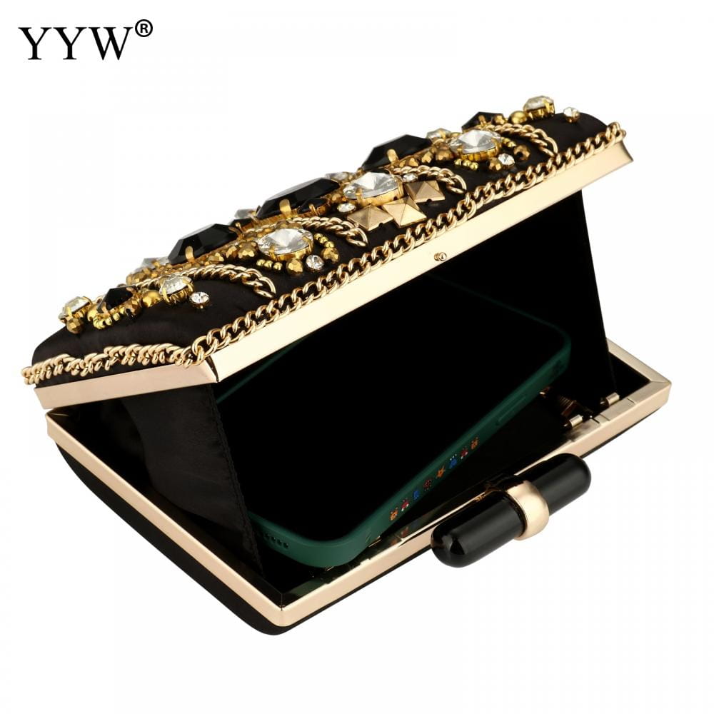 Ornate gold and black evening clutch in Black Satin Bohemia style with rhinestone details.