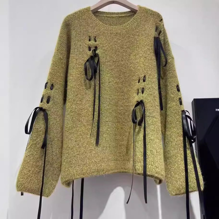 Ladies round neck loose knitted sweater with bow attachments