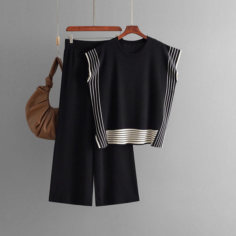 Black knit outfit with white stripes, round neck top and high waist wide leg pants set.