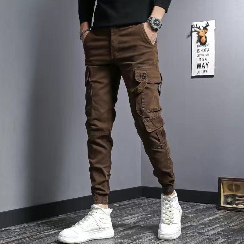 Brown Slim Fit Elastic Cargo Trousers with pockets for a trendy casual style.