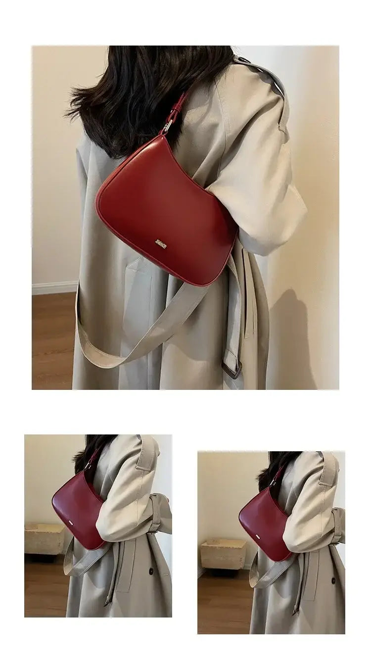 Sleek red leather shoulder bag crossbody with a chic curved silhouette for luxury style.