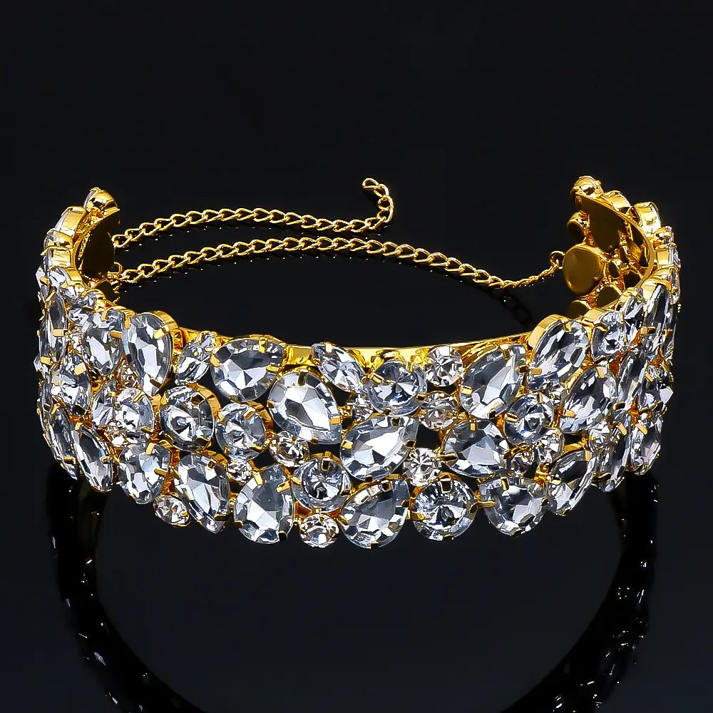 Exaggerated Water Diamond choker necklace with ornate gold tones and clear rhinestones.