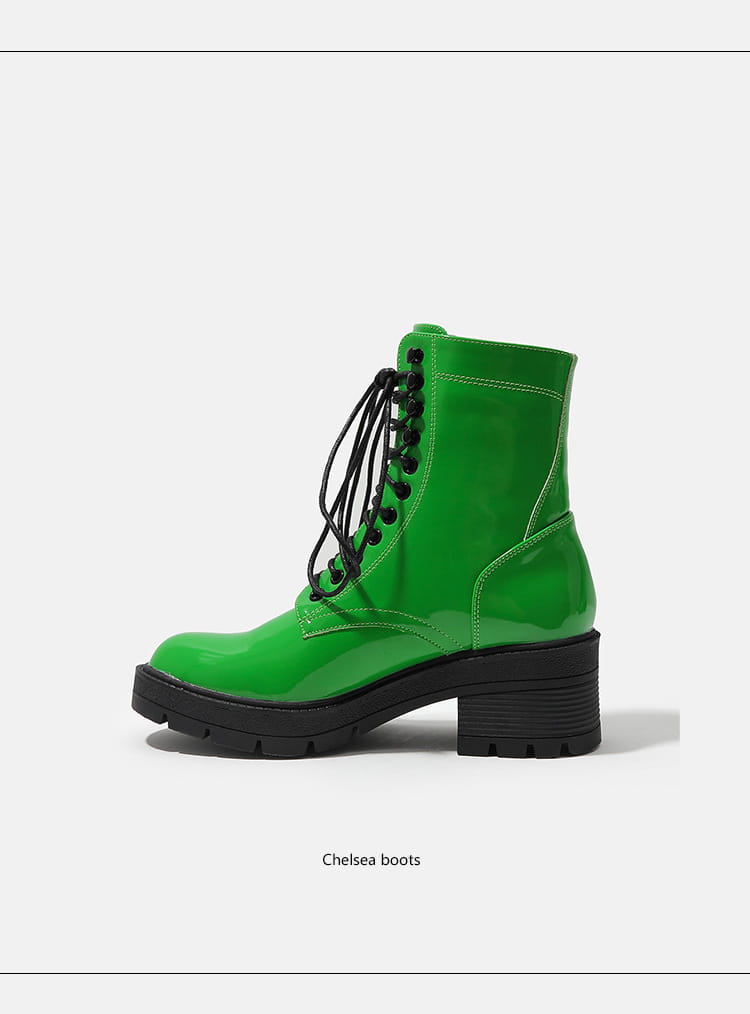 Bright green women’s patent thick sole boots winter with a chunky black heel.