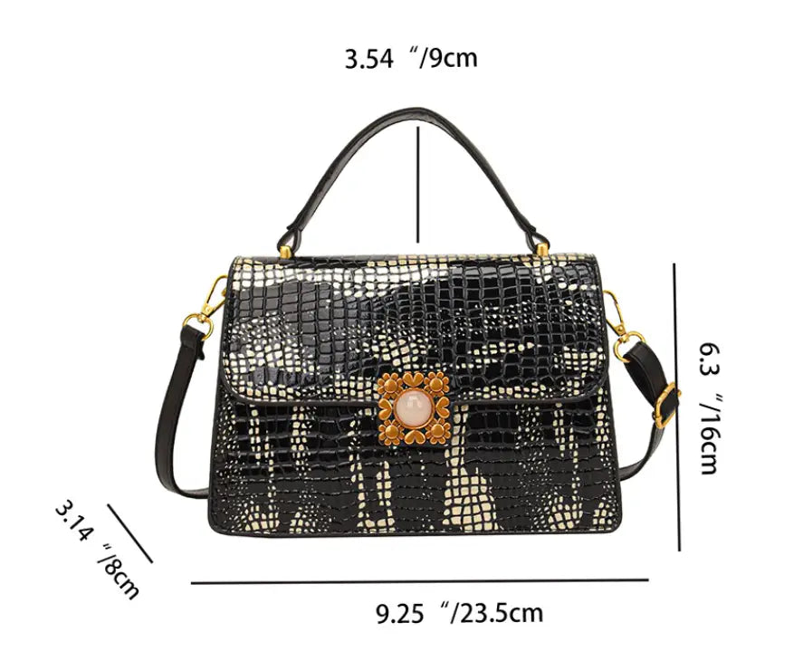 Stylish black crocodile pattern PU leather messenger bag with gold pearl clasp.