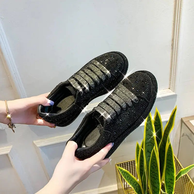 Sparkly black leisure shoes with rhinestone bling and thick sole lace design.