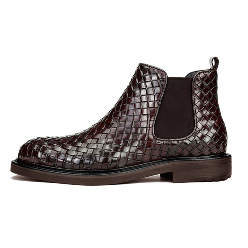 Dark brown men’s woven pattern short boots with elastic panels and chunky sole.