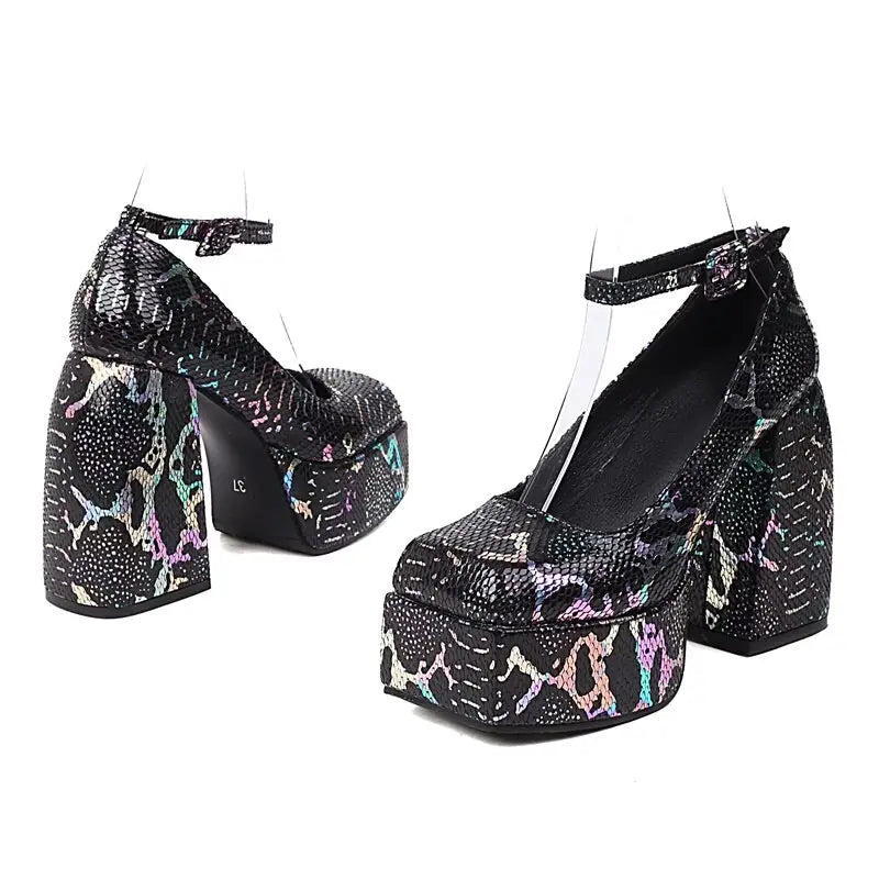 Floral square toe high heel sandals with snakeskin design and ankle straps.