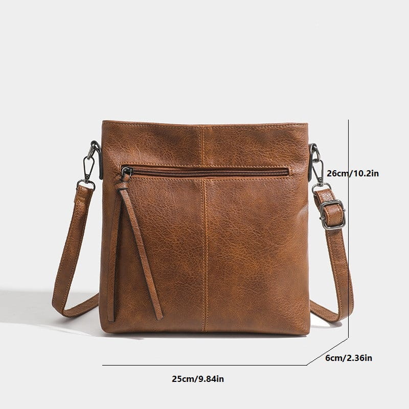 Brown leather crossbody bag with zipper pocket in high-end textured artificial leather style.