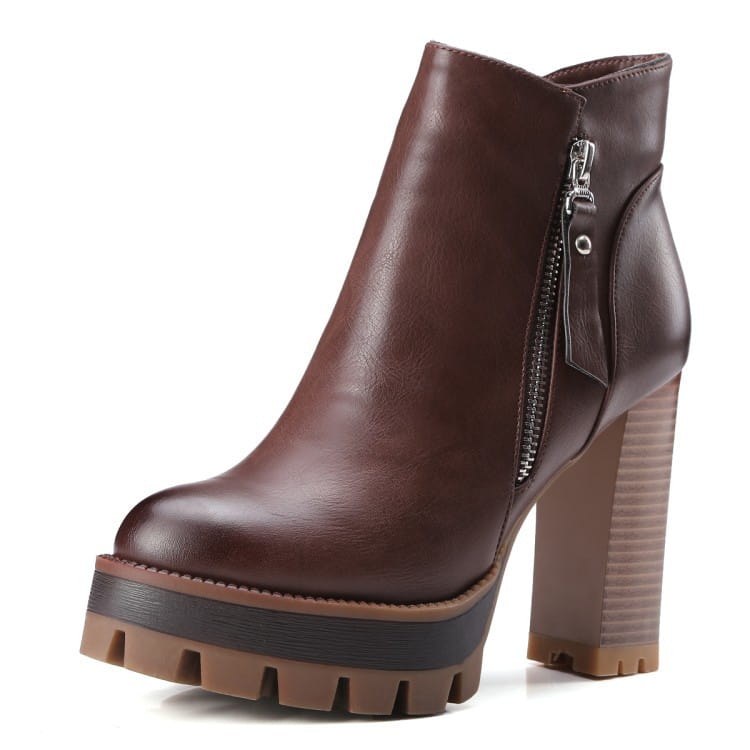 Brown leather British Retro High heel ankle boots with chunky sole and side zipper.